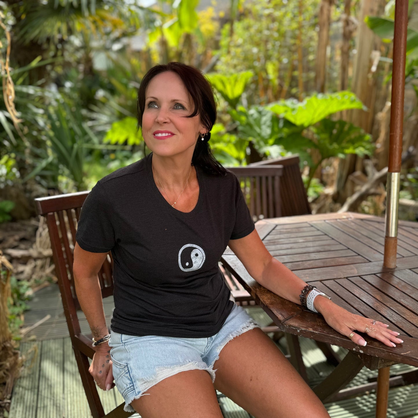 Model Wearing Black Positive Slogan Tee with Yin Yang Handpainted Design in White
