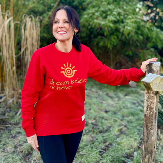 Positive Slogan Sweatshirts | Handpainted Sweatshirts | Model wearing dream believe achieve sweatshirt